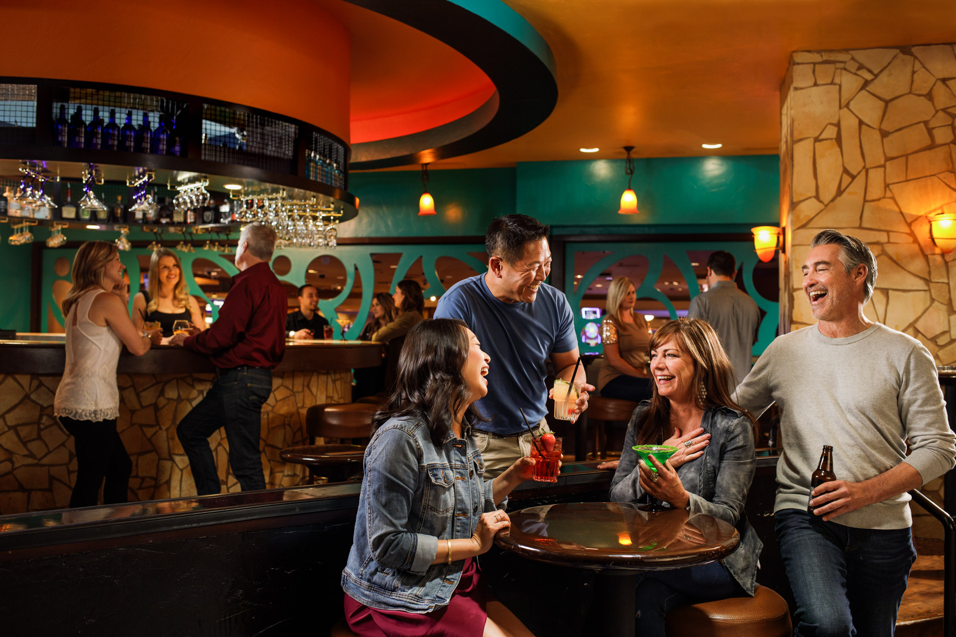 Friends enjoy drinks at a lounge