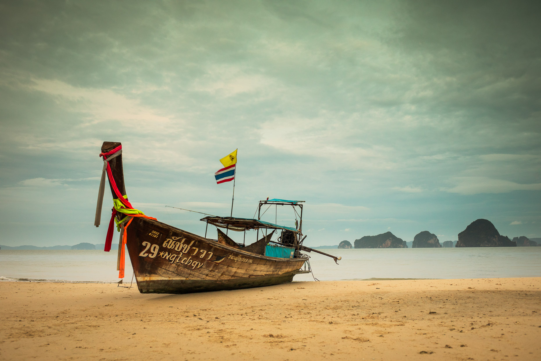 Beached long tail boat in Thailand 